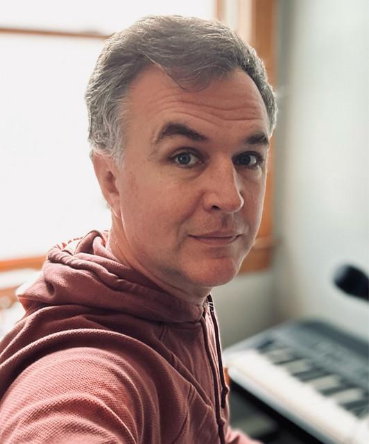 The Guy Who Sings Songs About Cities & Towns